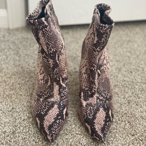Faux snake print heeled ankle booties. Size US 9
